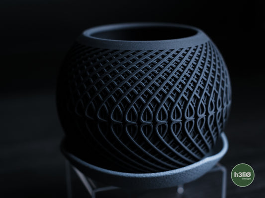 Kinetic Planter with wrap around drip plate