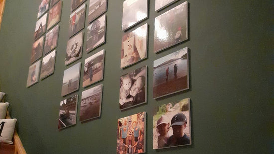 60 photo tiles on wall with stairs