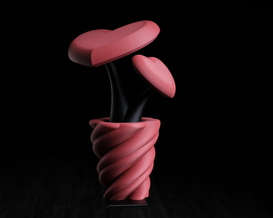 Pink abstract sculpture on a black background with 'h3io design' logo.